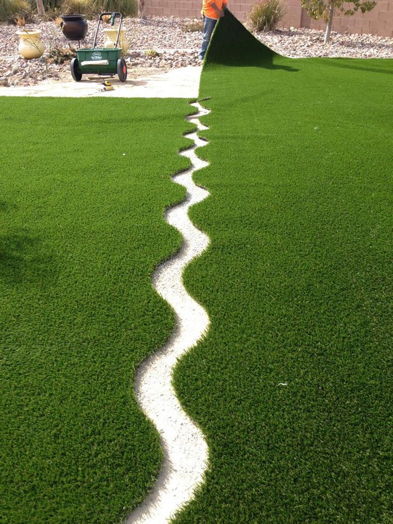 A white line is drawn across the grass.